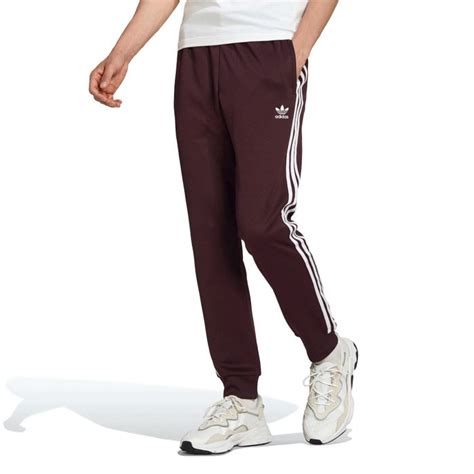 adidas sst trainingshose farbe lila herren